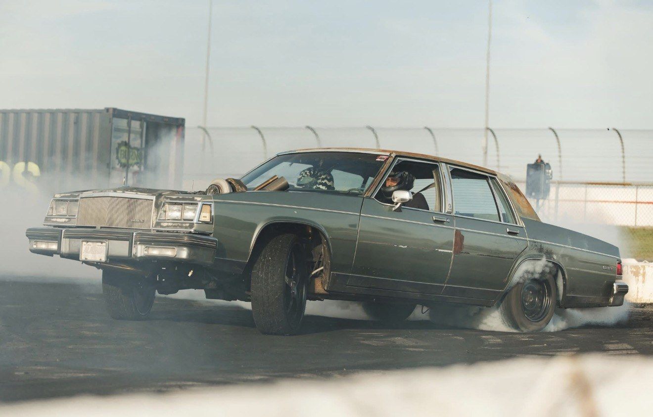 Turbo LS Buick LeSabre mid-burnout, single turbo visible